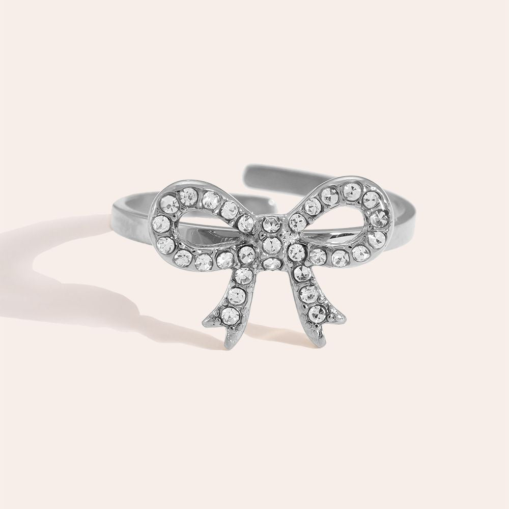 Silver bowtie diamond ring