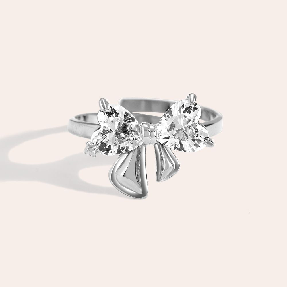 Silver bowtie diamond ring