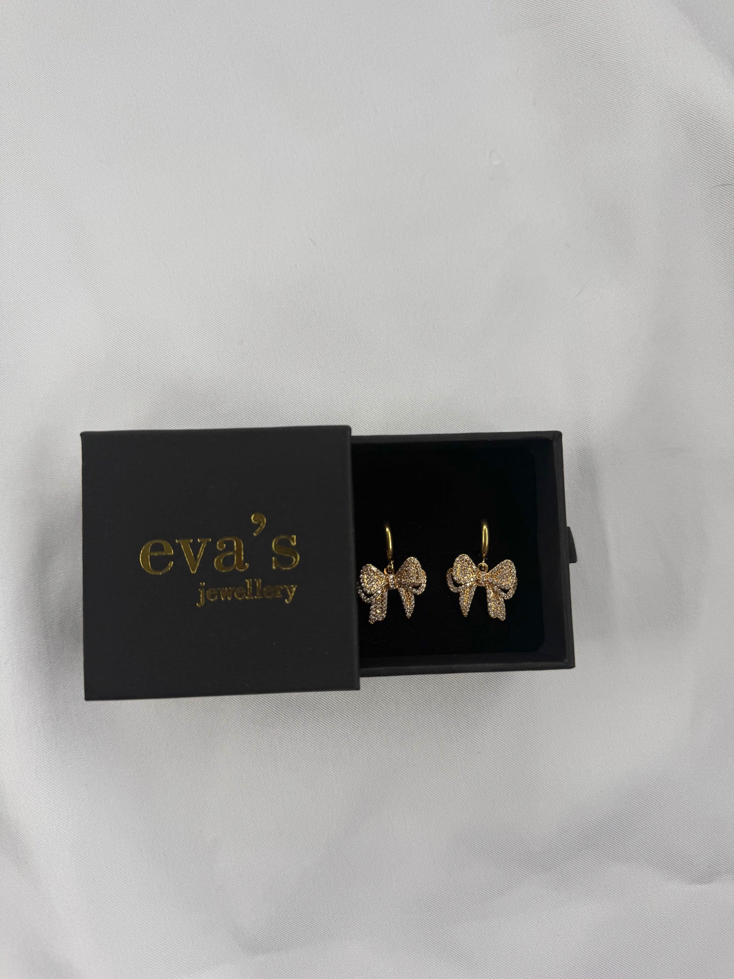Gold bow earrings