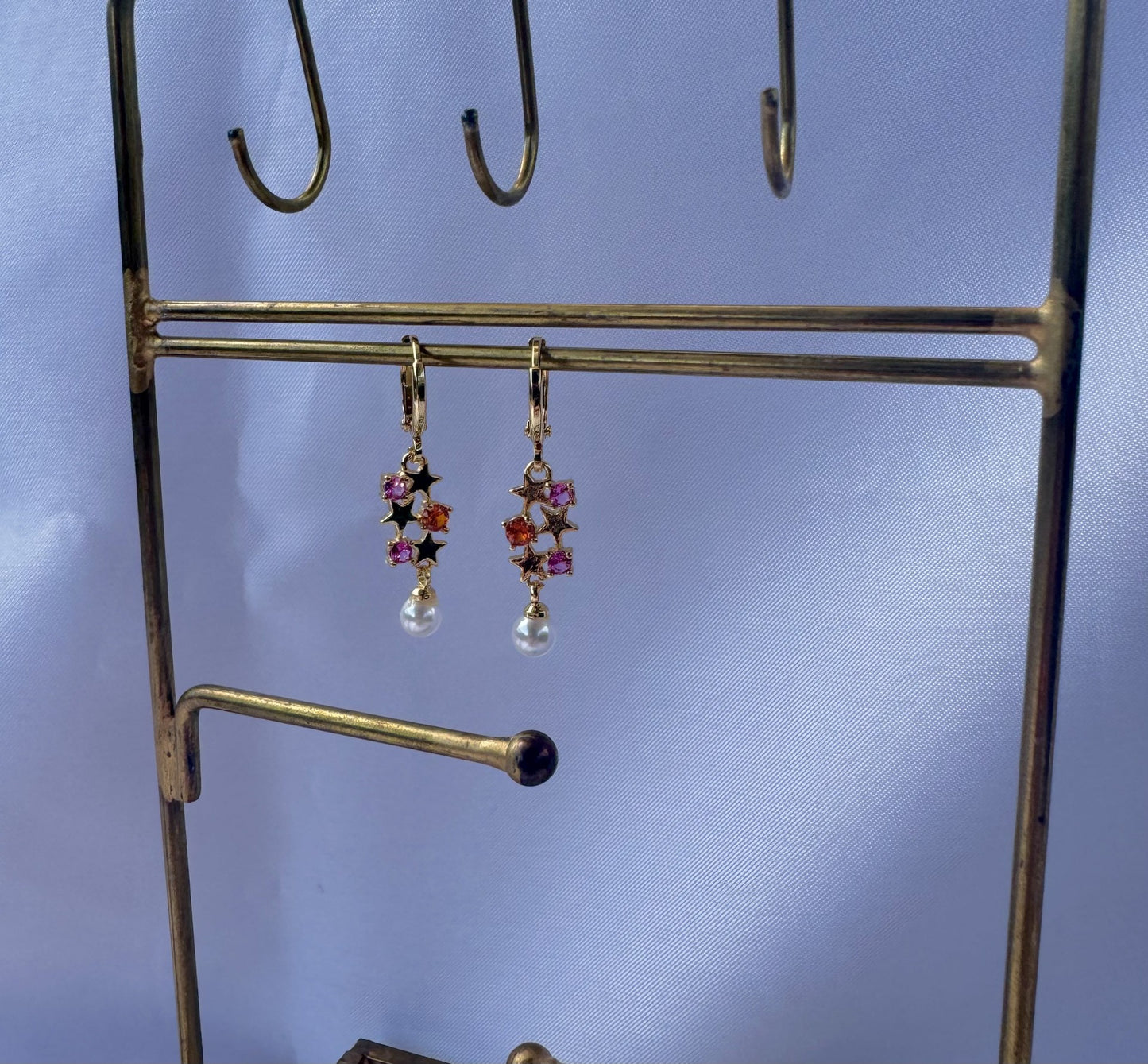 Diamond star and hoop earrings