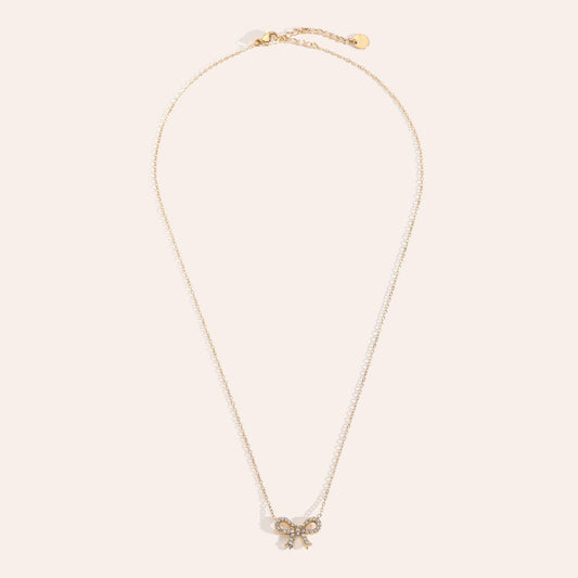 Gold bow necklace